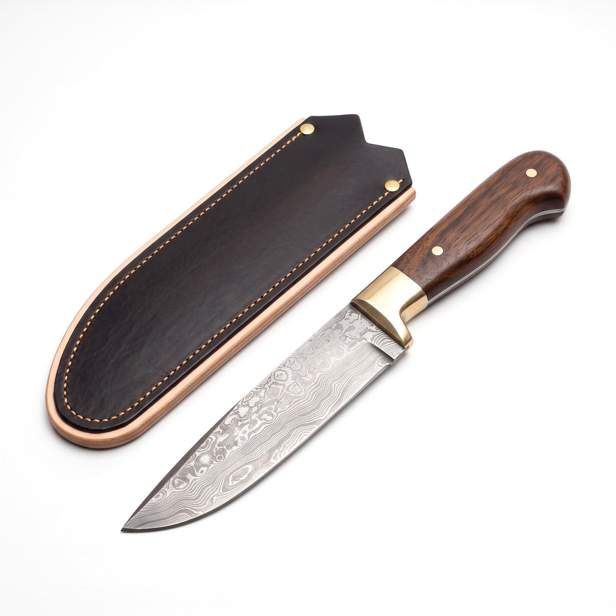 6.3" Damascus Utility Knife | Walnut & Brass, three-quarter view with the Crownridge blade guard