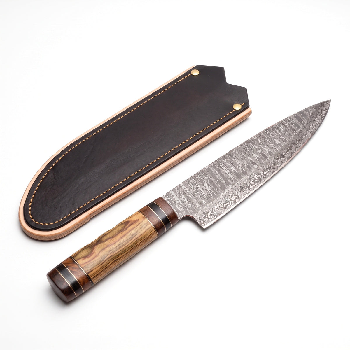 13" Damascus Chef Knife | Olive Pakka Wood, three-quarter view with the Crownridge blade guard