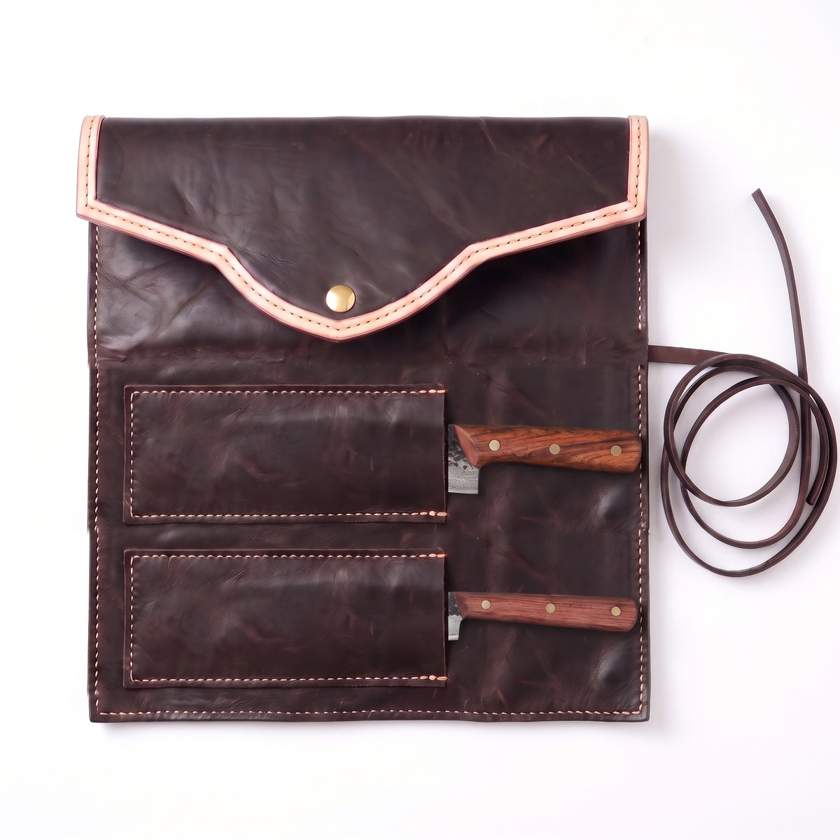 2-Piece Damascus Kitchen Knife Set | Rosewood & Brass, seated in the Crownridge knife roll