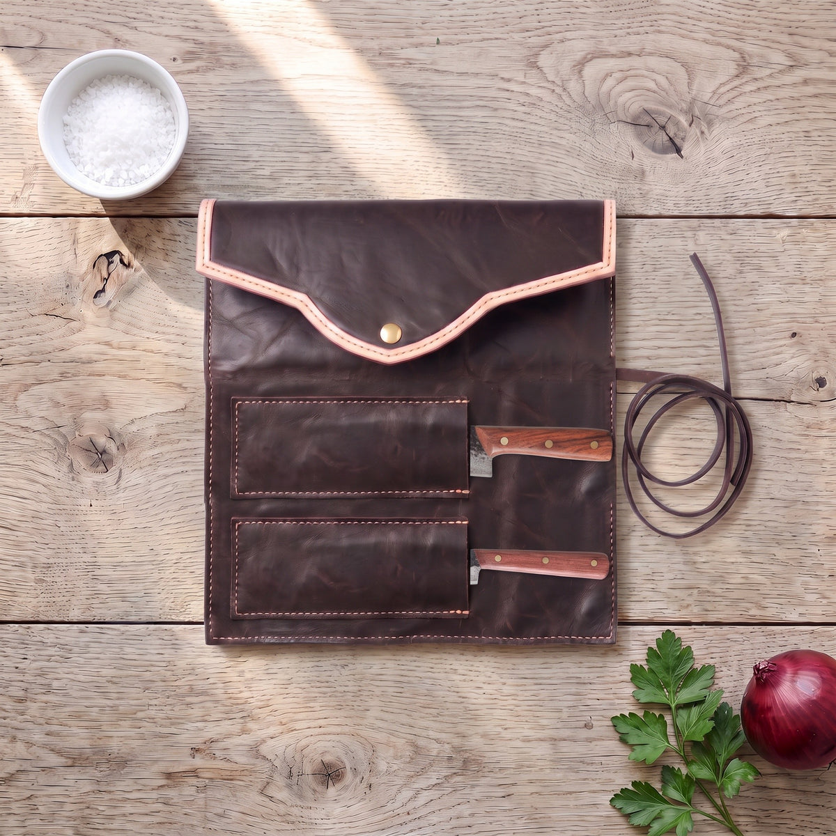 2-Piece Damascus Kitchen Knife Set | Rosewood & Brass, with the Crownridge knife roll in use