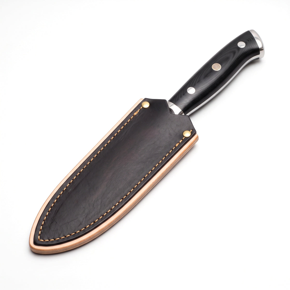 3.5" Damascus Paring Knife | Black Micarta, seated in the Crownridge blade guard