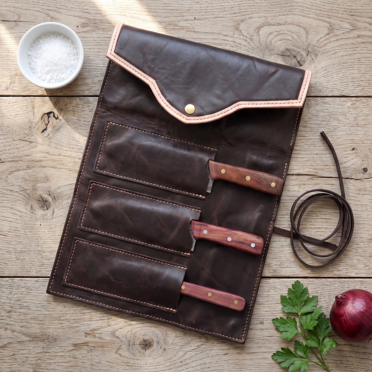 3-Piece Damascus Kitchen Knife Set | Rosewood & Brass, with the Crownridge knife roll in use