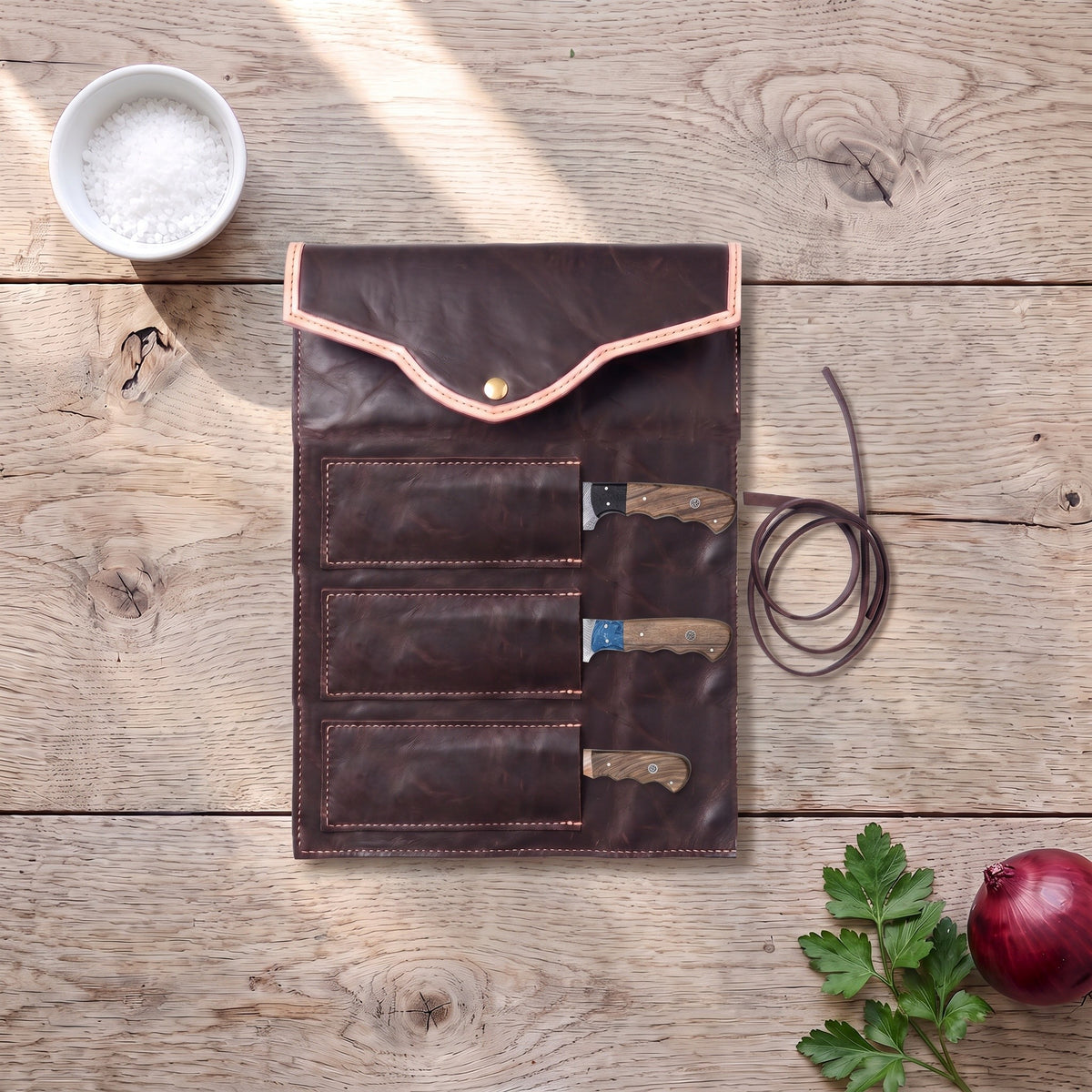 3-Piece Damascus Kitchen Knife Set | Rosewood, with the Crownridge knife roll in use