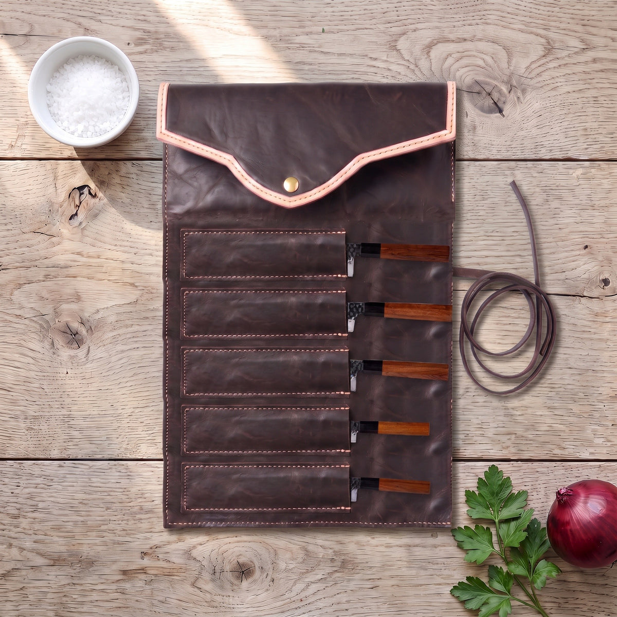 5-Piece Carbon Steel Kitchen Knife Set | Rosewood, with the Crownridge knife roll in use