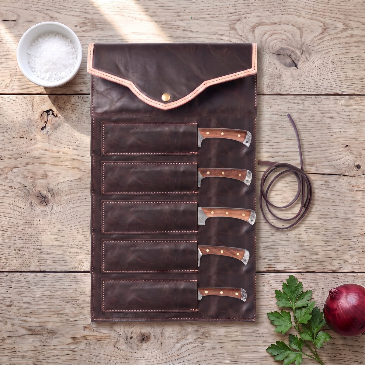 5-Piece Damascus Kitchen Knife Set | Rosewood, with the Crownridge knife roll in use