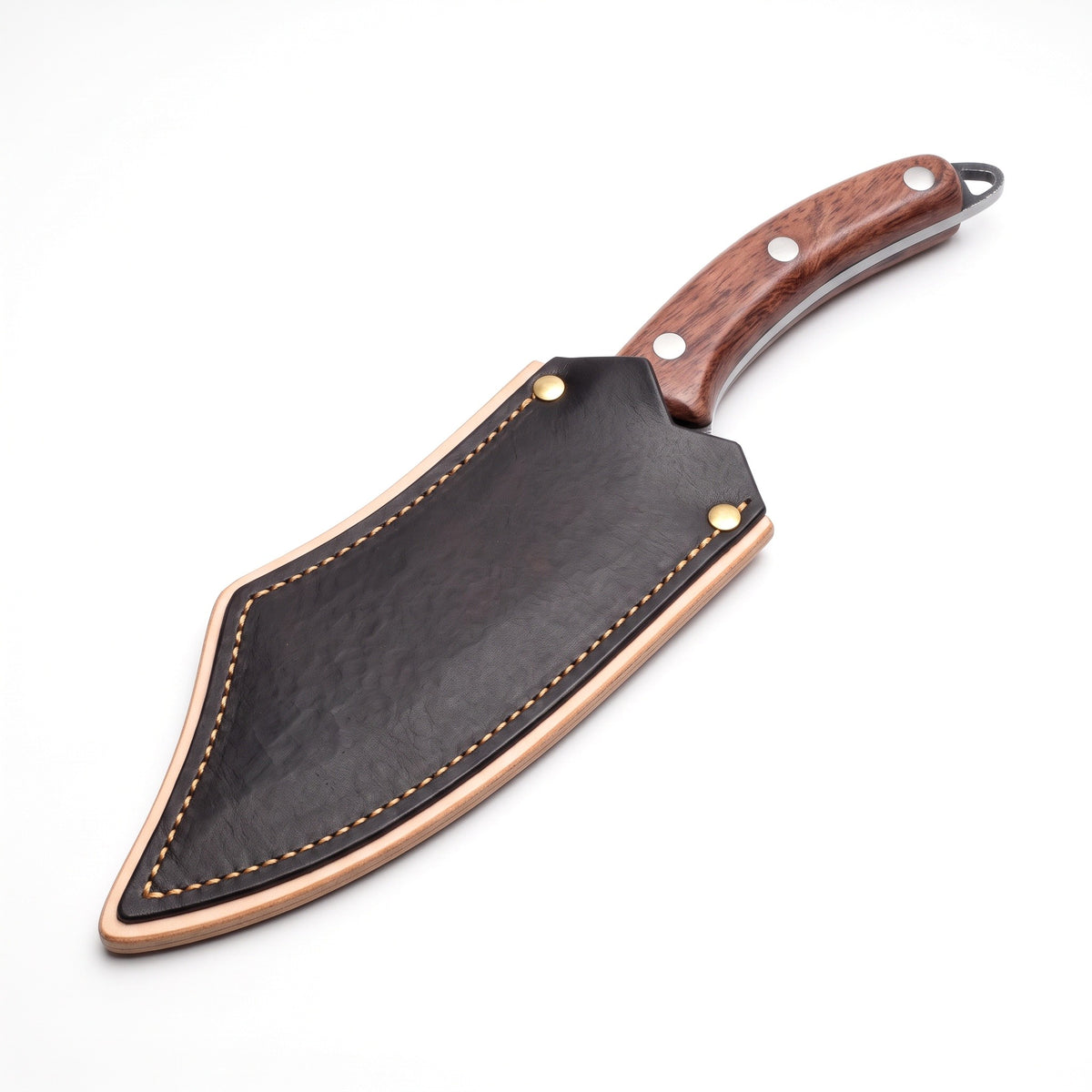 6.5" Carbon Steel Boning Knife | Rosewood, seated in the Crownridge blade guard