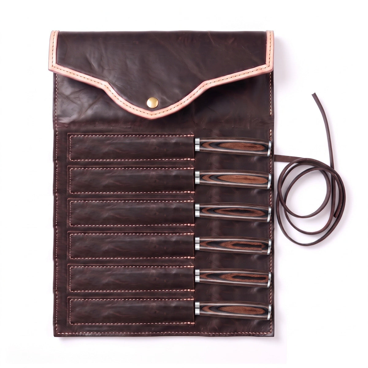 6-Piece Carbon Steel Steak Knife Set | Pakkawood, seated in the Crownridge knife roll
