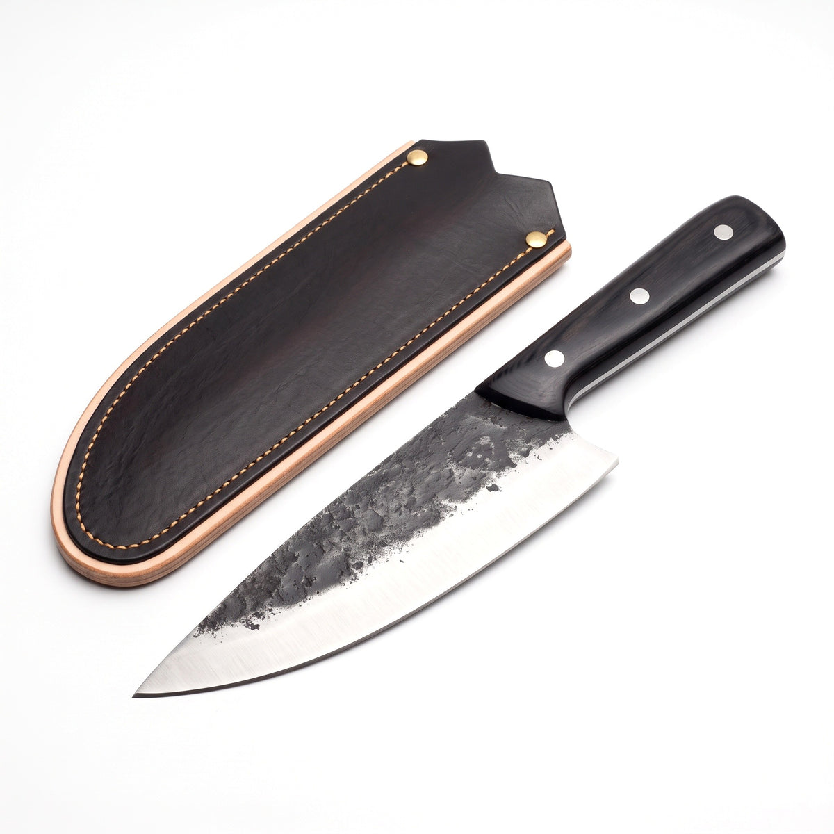 7.5" Carbon Steel Chef Knife | Pakkawood, three-quarter view with the Crownridge blade guard