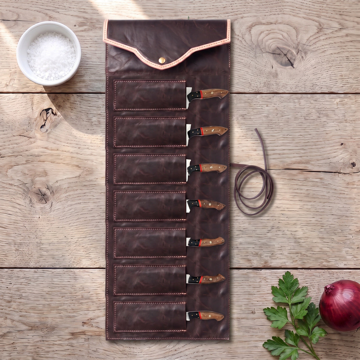7-Piece Stainless Kitchen Knife Set | Pakka Wood, with the Crownridge knife roll in use