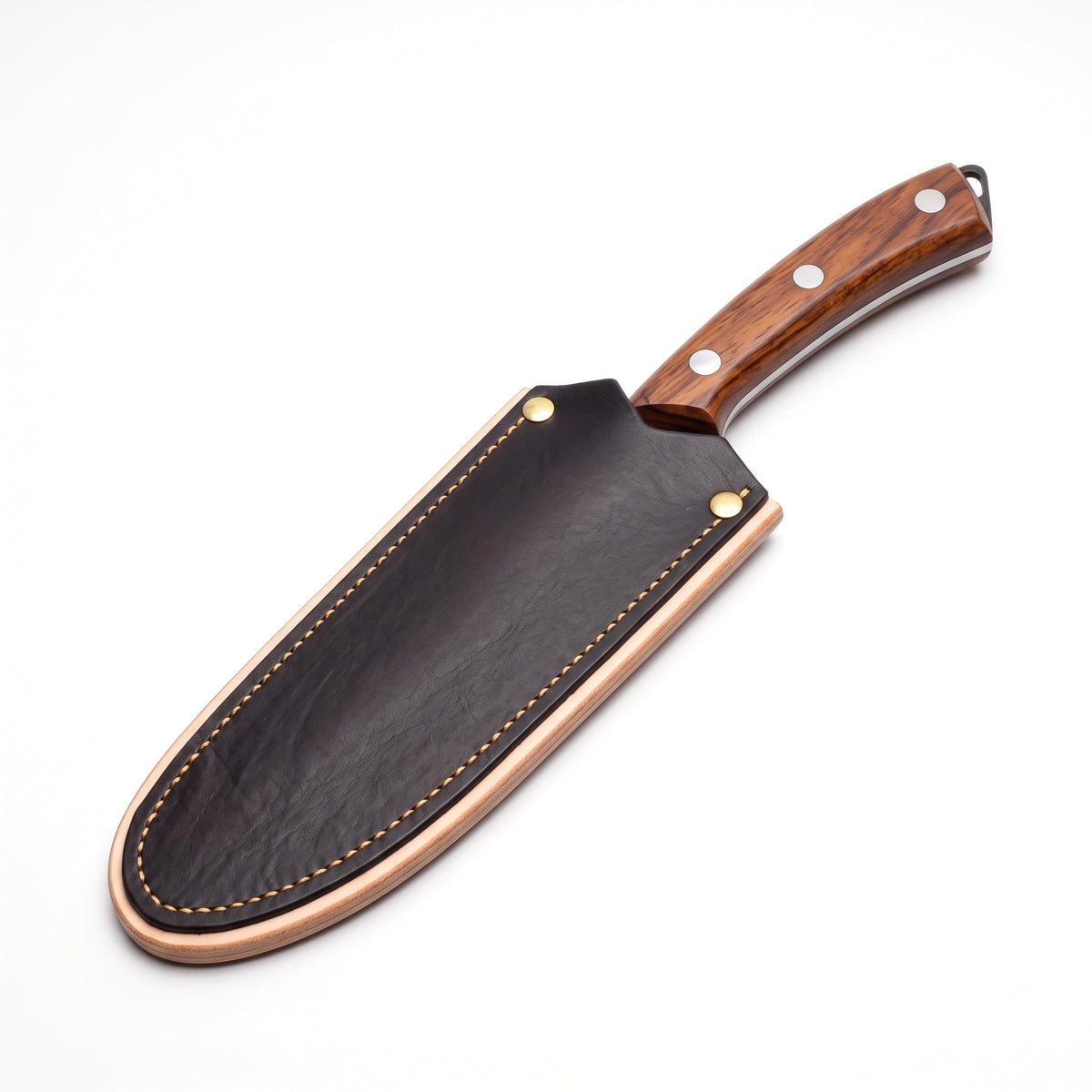 8" Carbon Steel Chef Knife | Rosewood, seated in the Crownridge blade guard
