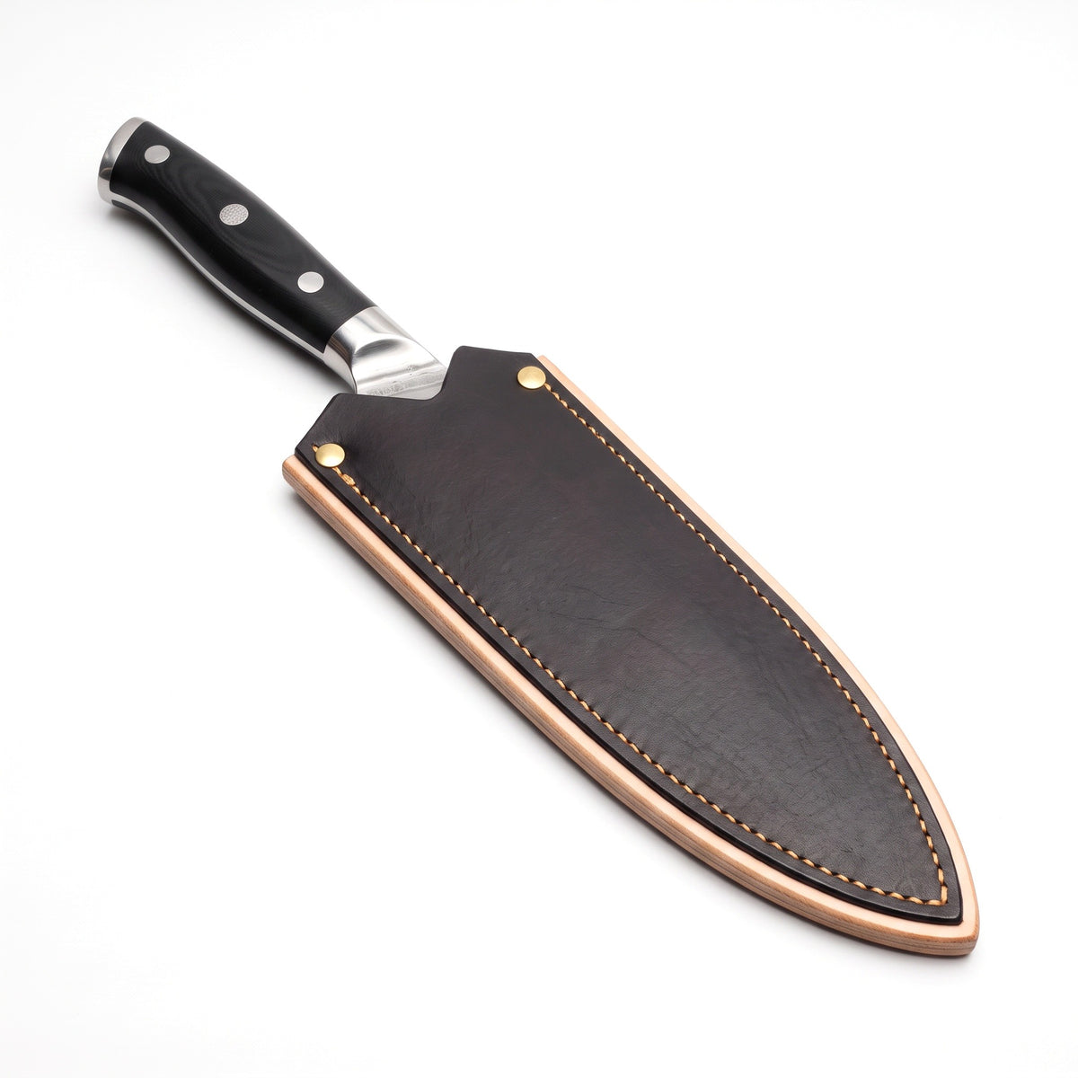 8" Damascus Chef Knife | Black Resin, seated in the Crownridge blade guard