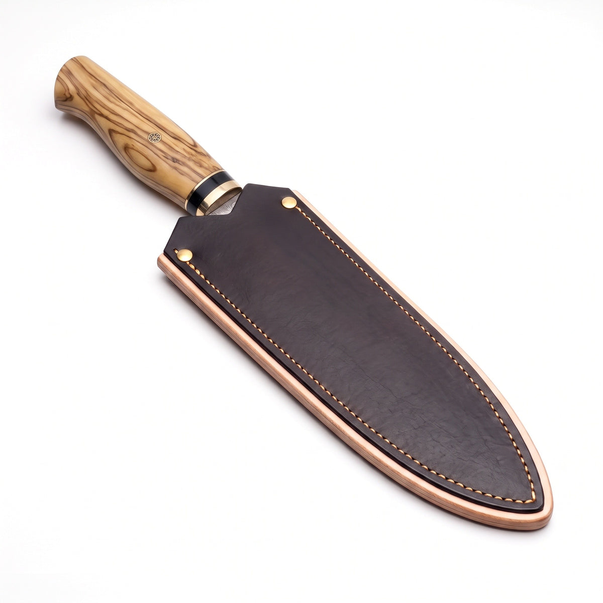 8" Damascus Chef Knife | Olive Wood, seated in the Crownridge blade guard