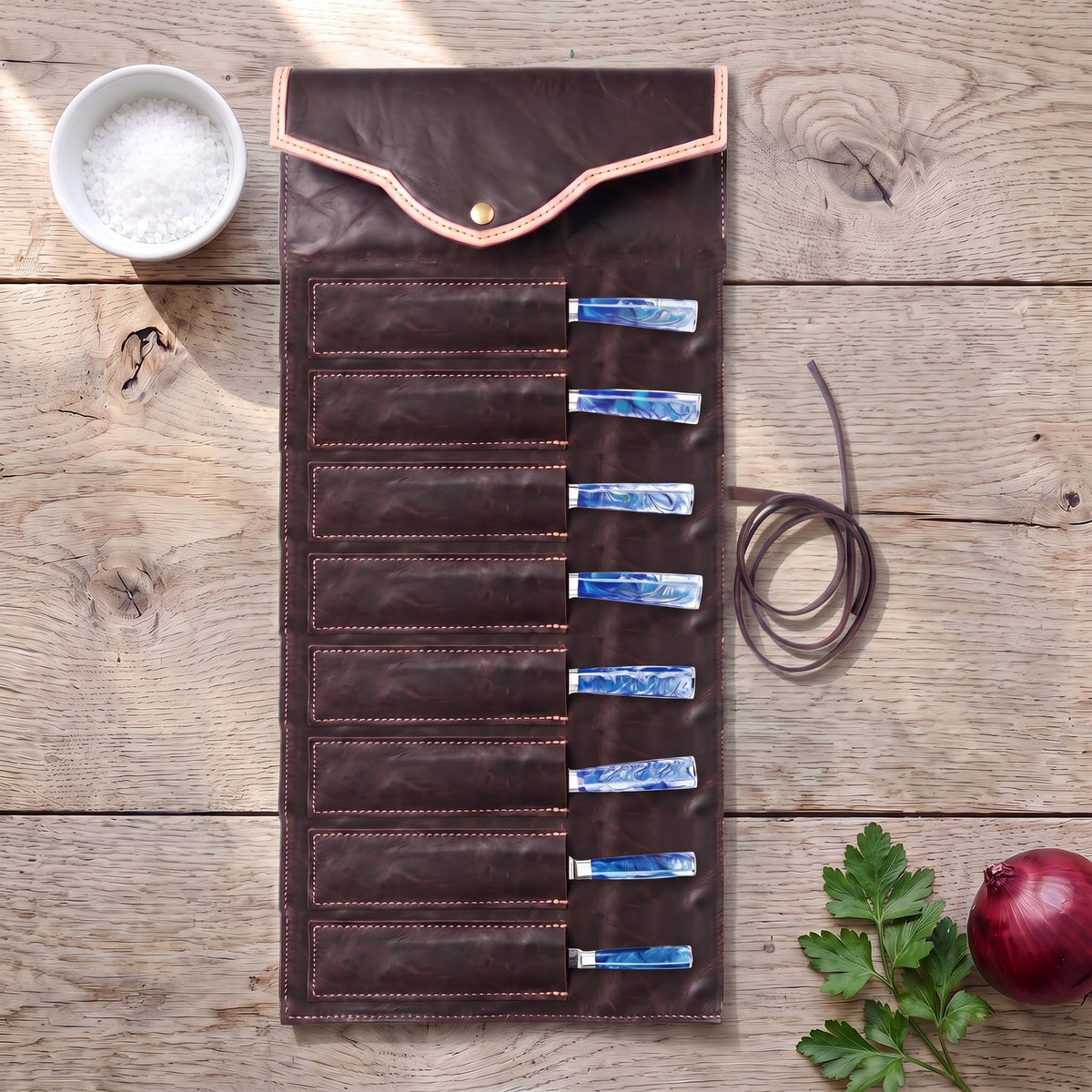 8-Piece Damascus Kitchen Knife Set | Resin, with the Crownridge knife roll in use