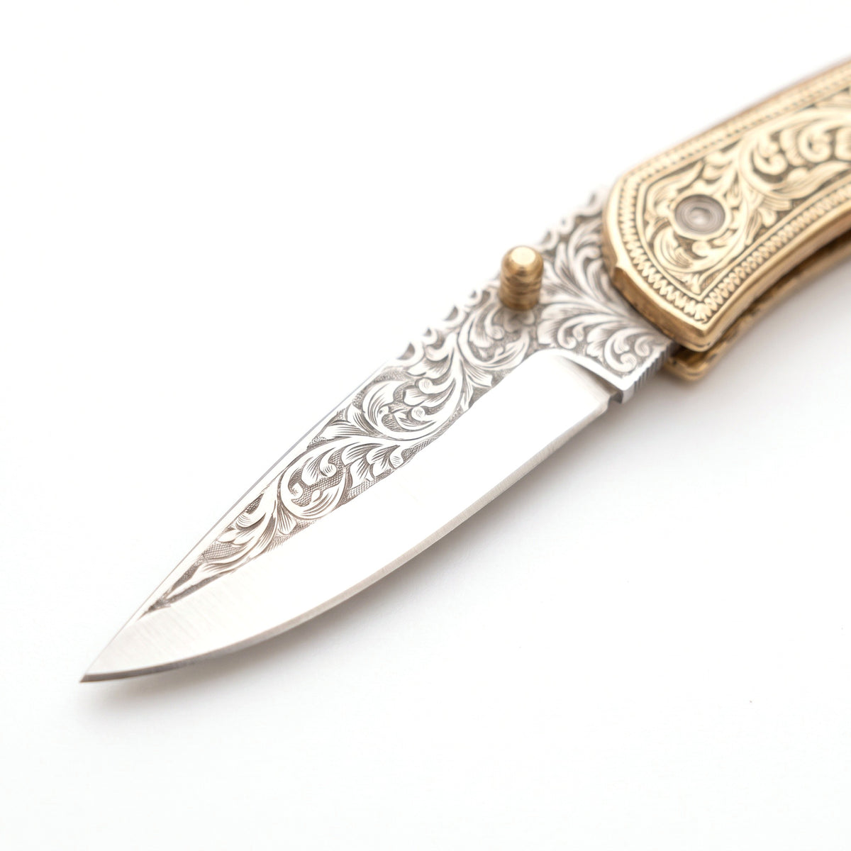 Creek 7.75" Carbon Steel Pocket Knife | Brass, carbon steel blade close-up