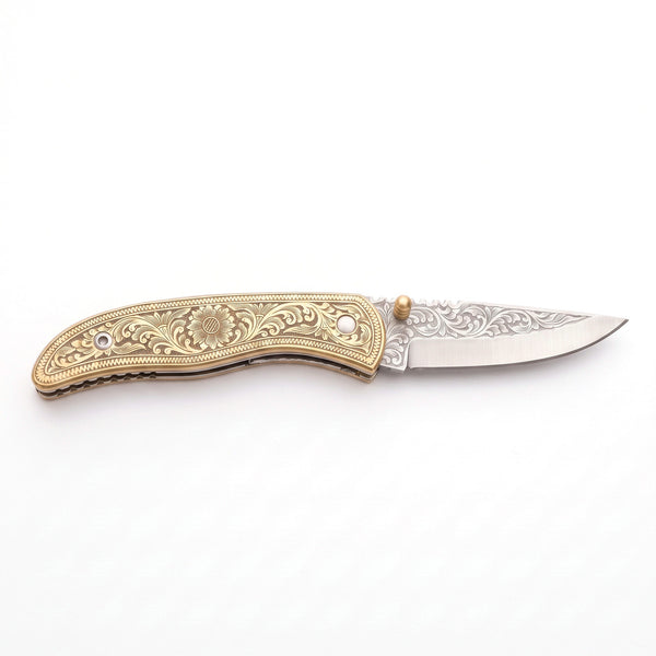 Creek 7.75" Carbon Steel Pocket Knife | Brass, side profile on white