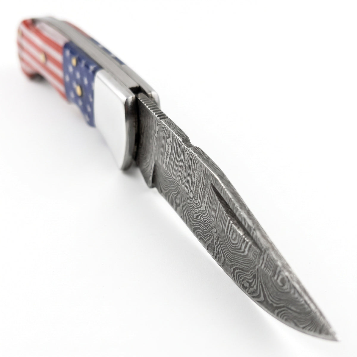 Creek 6.5" Damascus Pocket Knife | Flag Resin, Damascus blade close-up