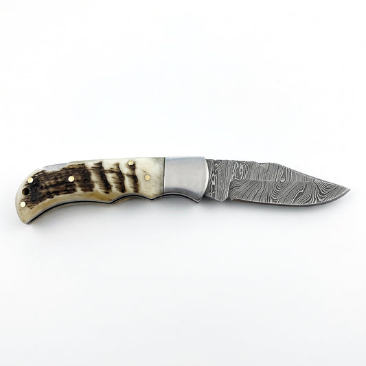 Creek 6.5" Damascus Pocket Knife | Ram Horn, side profile on white