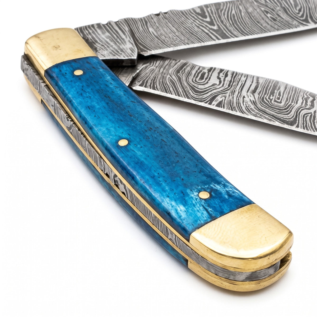 Creek 6.5" Damascus Trapper Knife | Blue Bone, handle and fittings close-up