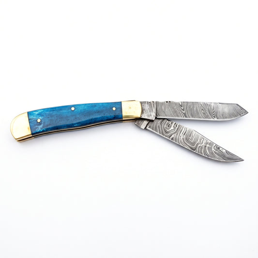 Creek 6.5" Damascus Trapper Knife | Blue Bone, side profile on white