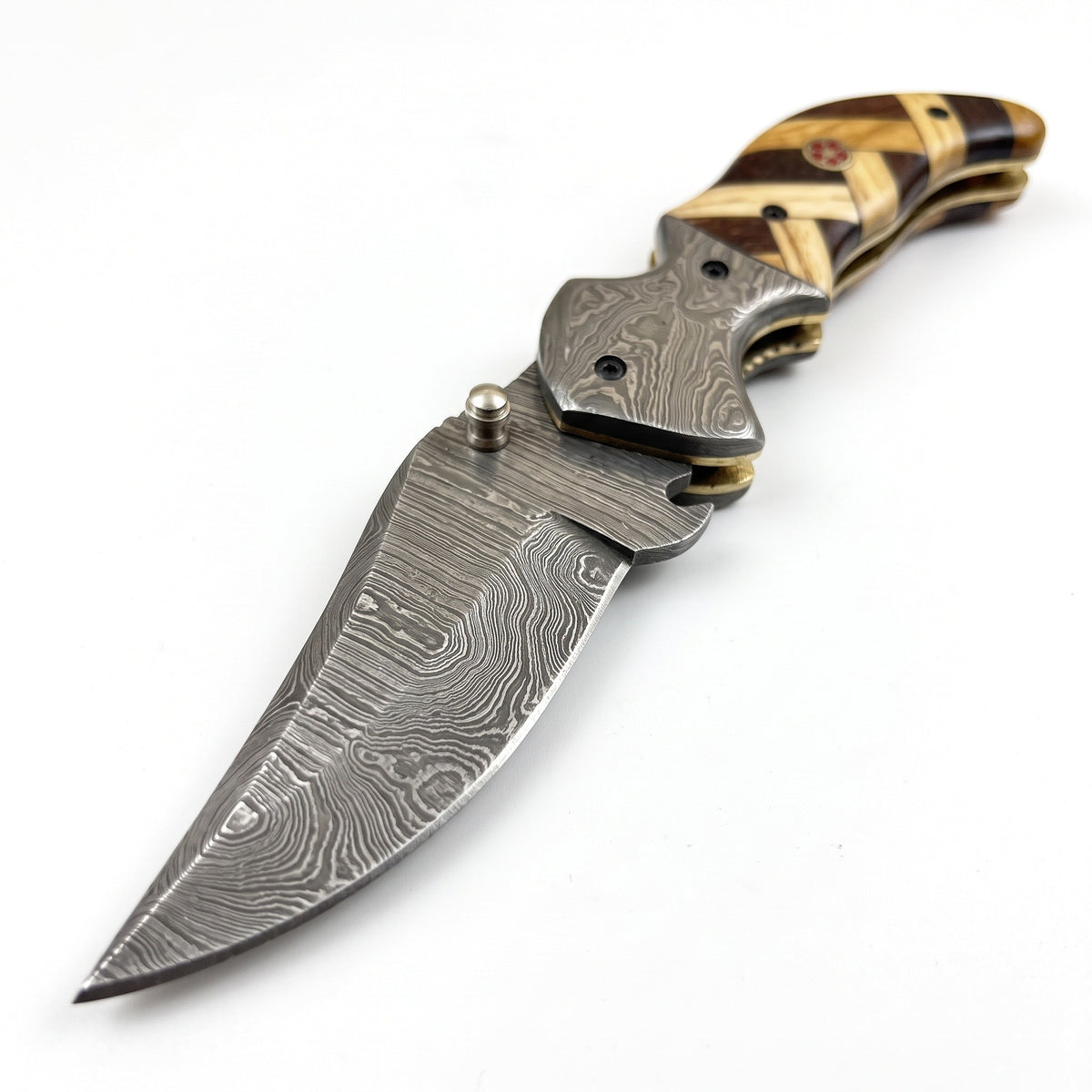 Creek 7" Damascus Clip Point Pocket Knife | Olive Wood, Damascus blade close-up