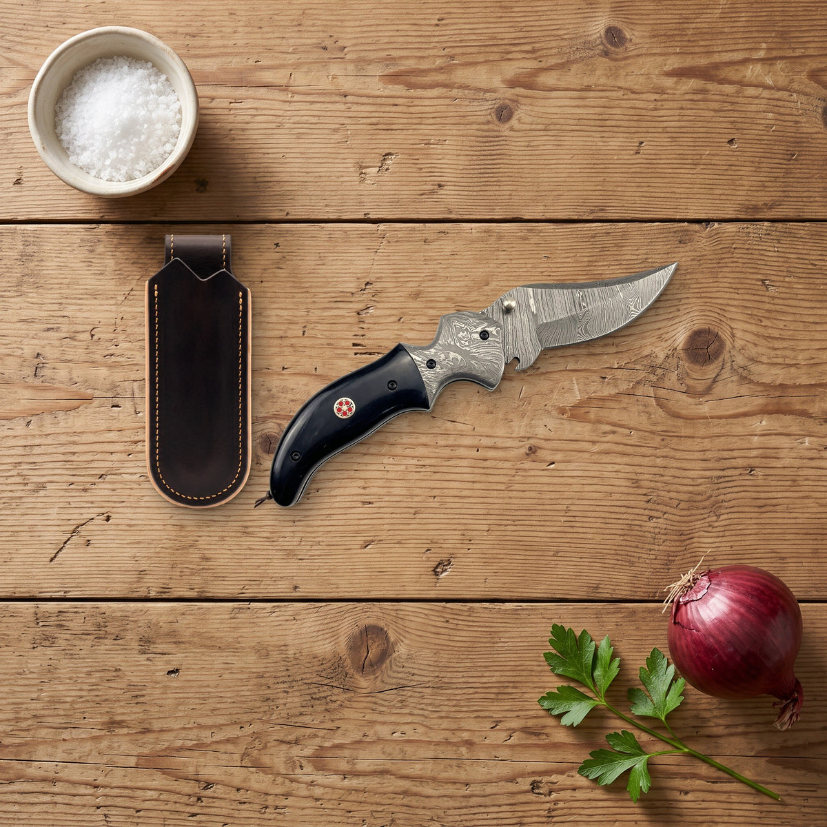 Creek 7" Damascus Pocket Knife | Buffalo Horn, with the Crownridge belt slip in use