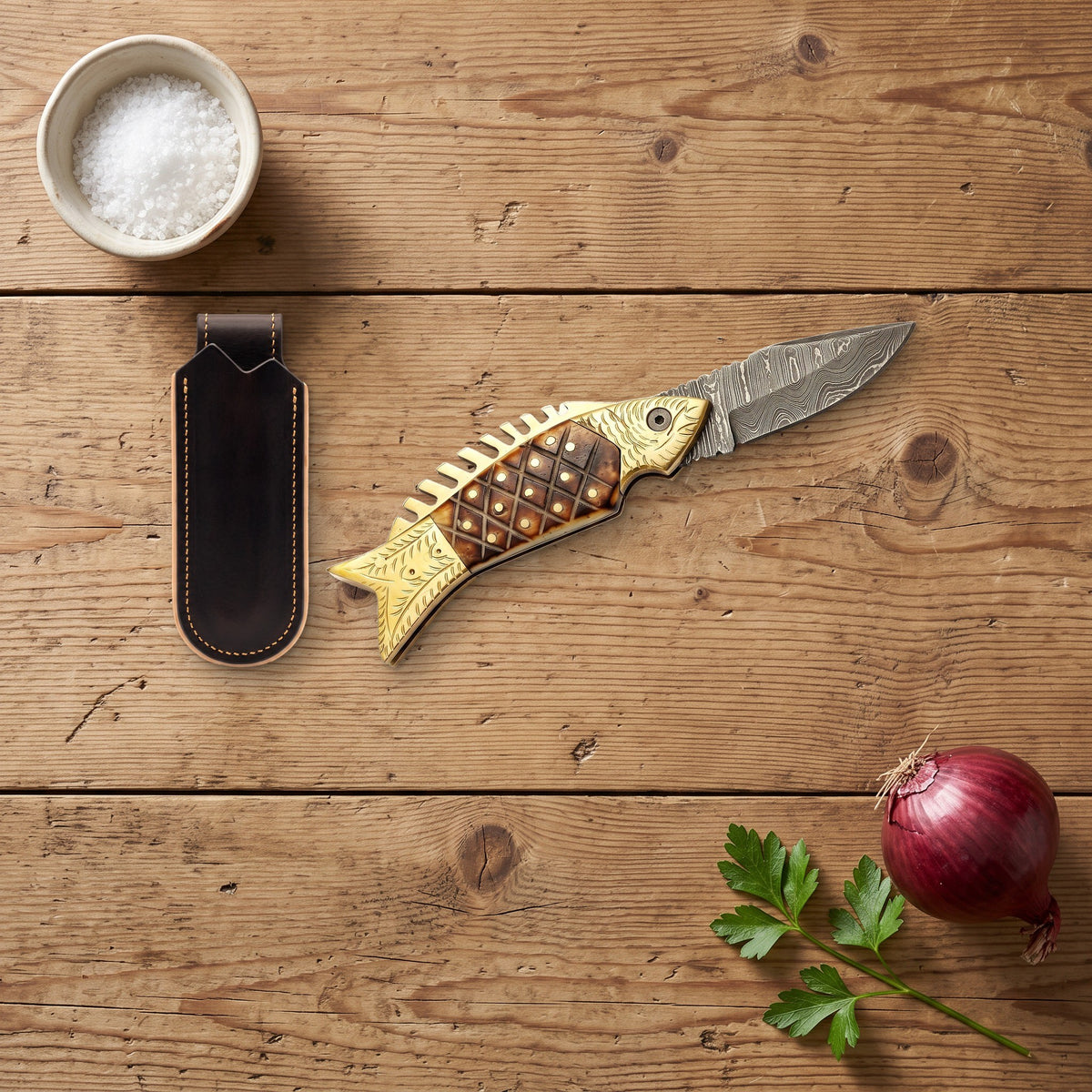 Creek 7" Damascus Pocket Knife | Camel Bone, with the Crownridge belt slip in use