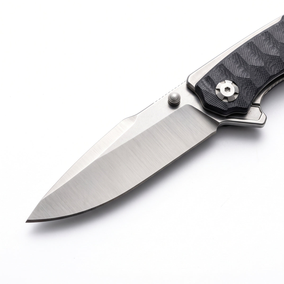 Creek 8.5" Carbon Steel Pocket Knife | G10, carbon steel blade close-up