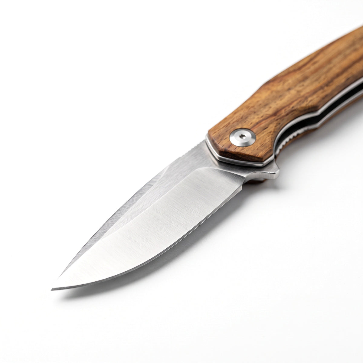 Creek 8" Carbon Steel Pocket Knife | Sandalwood, carbon steel blade close-up