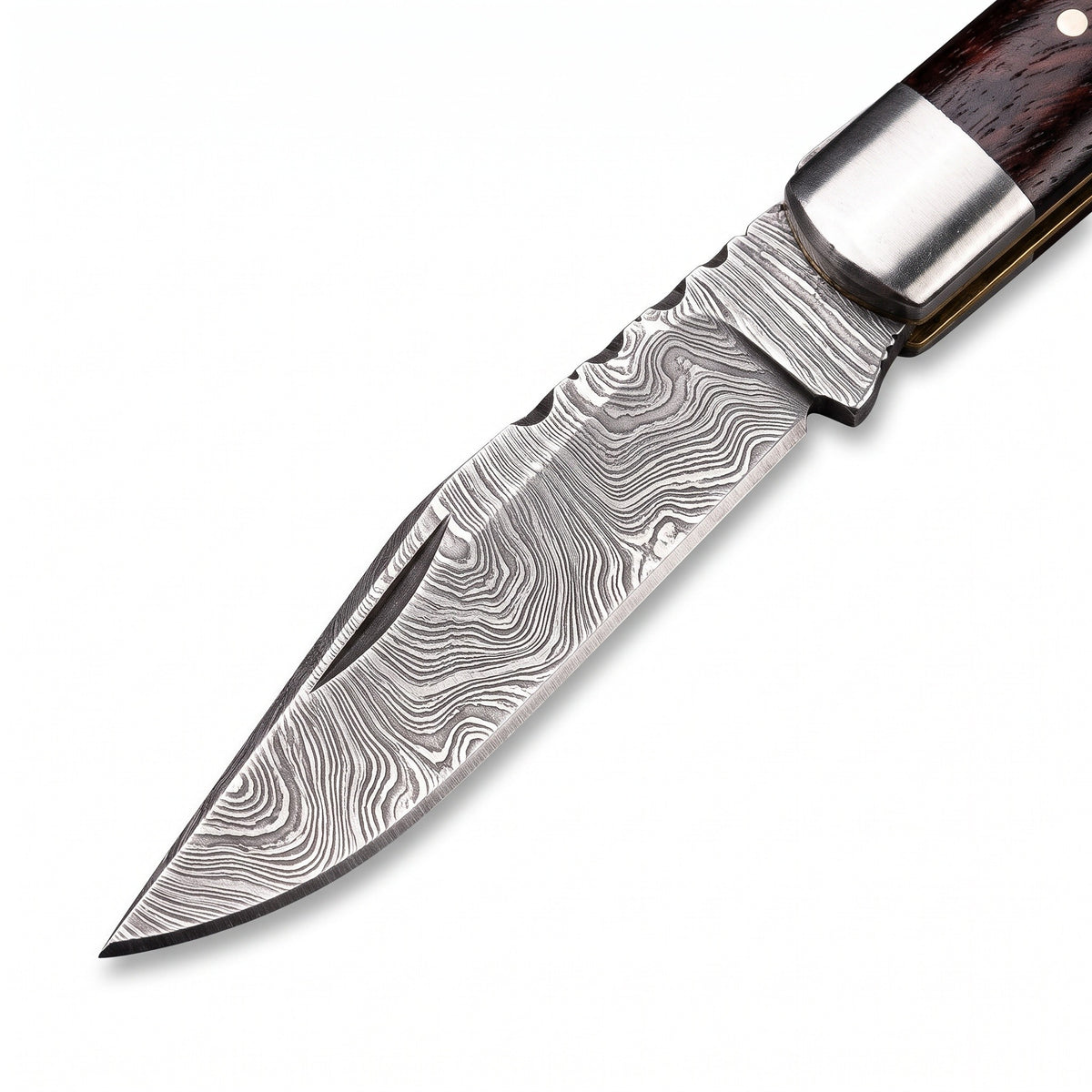 Creek 8" Damascus Trapper Knife | Rosewood, Damascus blade close-up