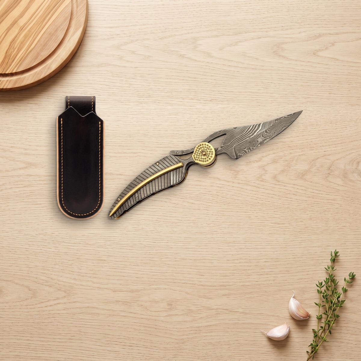 Creek 9.2" Damascus Pocket Knife | Damascus Steel, with the Crownridge belt slip in use