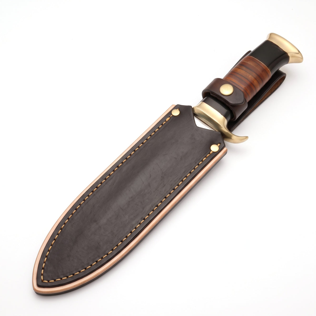 Highline 15" Carbon Steel Bowie Knife | Buffalo Horn & Brass, seated in the Crownridge sheath