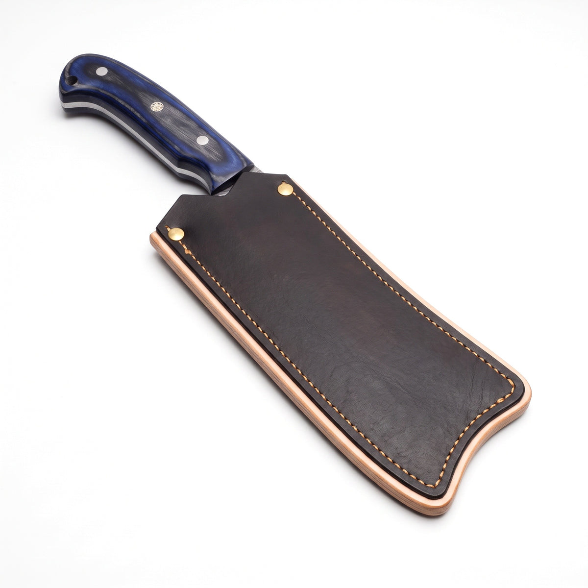 Hollow 10" Damascus Serbian Chef Knife | Blue Pakkawood, seated in the Crownridge blade guard