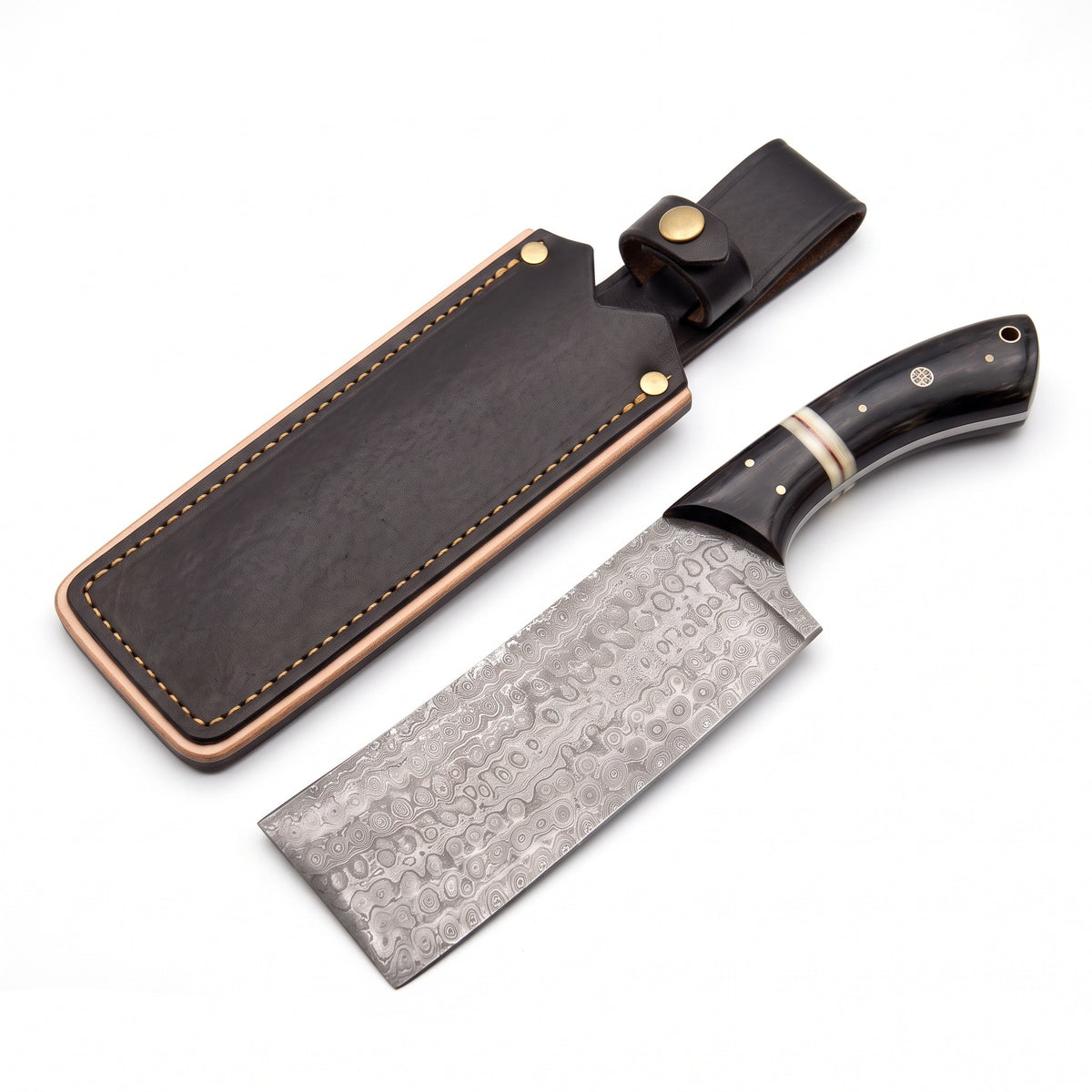 Hollow 12.5" Damascus Cleaver | Black Horn, three-quarter view with the Crownridge sheath