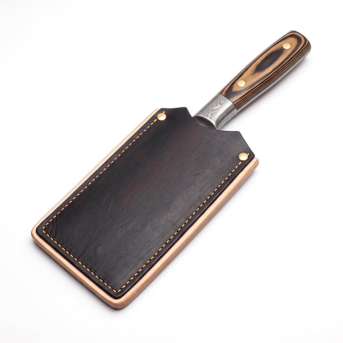 Hollow 6.5" Damascus Meat Cleaver | Pakkawood, seated in the Crownridge blade guard