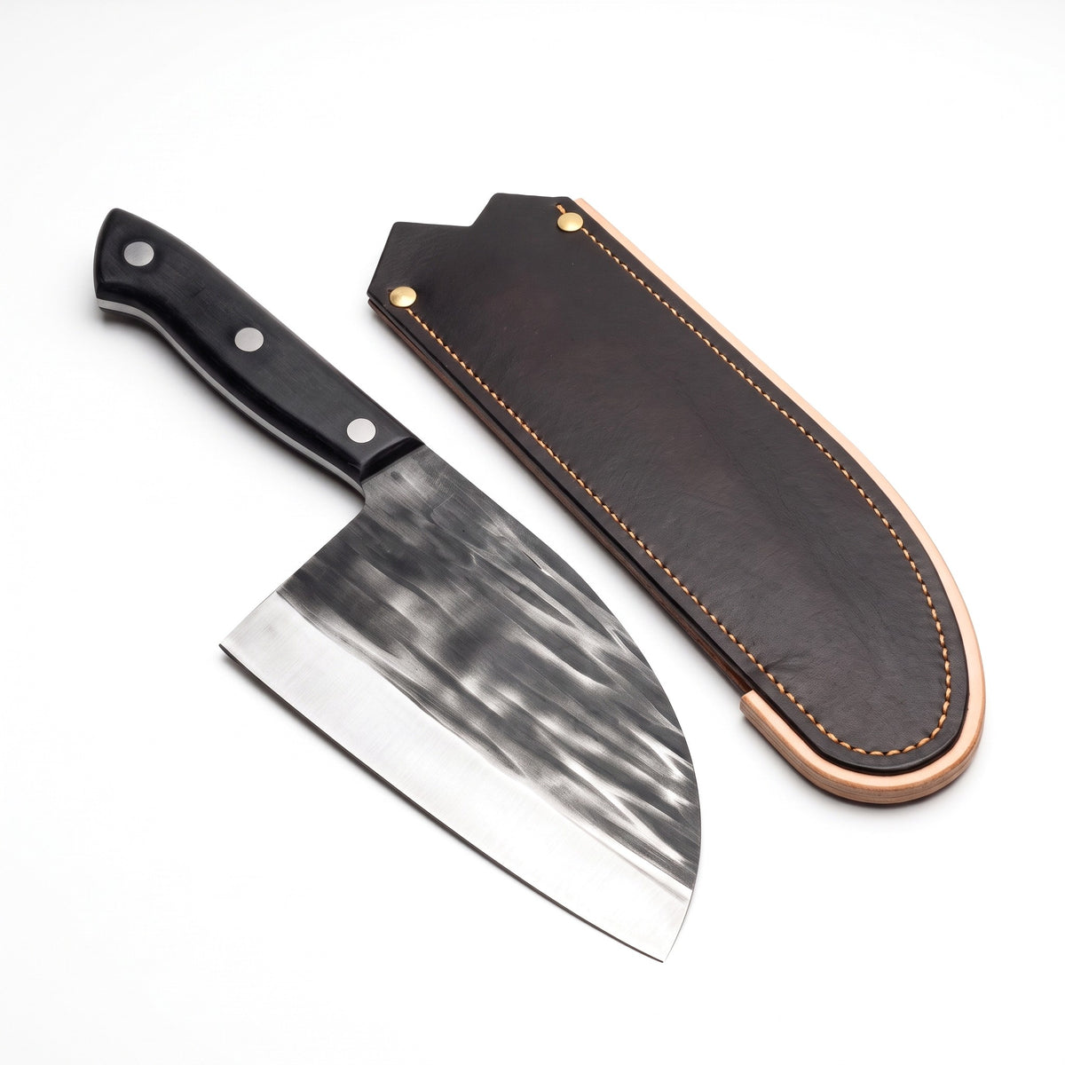 Hollow 7" Carbon Steel Serbian Chef Knife | Black Micarta, three-quarter view with the Crownridge blade guard