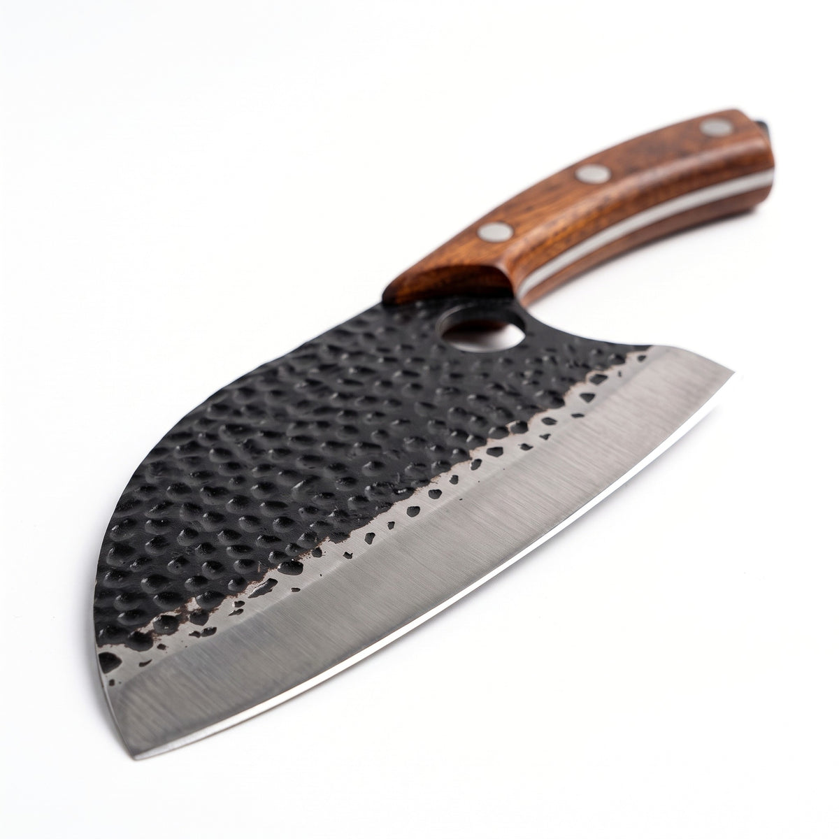 Hollow 7" Carbon Steel Serbian Chef Knife | Bone, carbon steel blade close-up