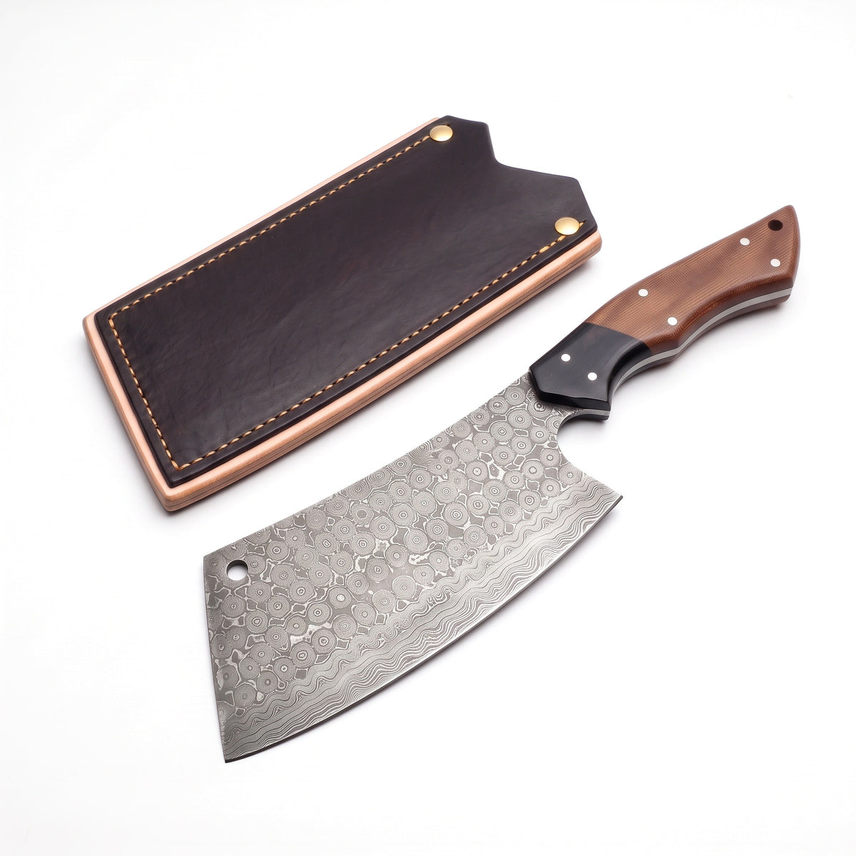 Hollow 8" Damascus Meat Cleaver | Micarta, three-quarter view with the Crownridge blade guard