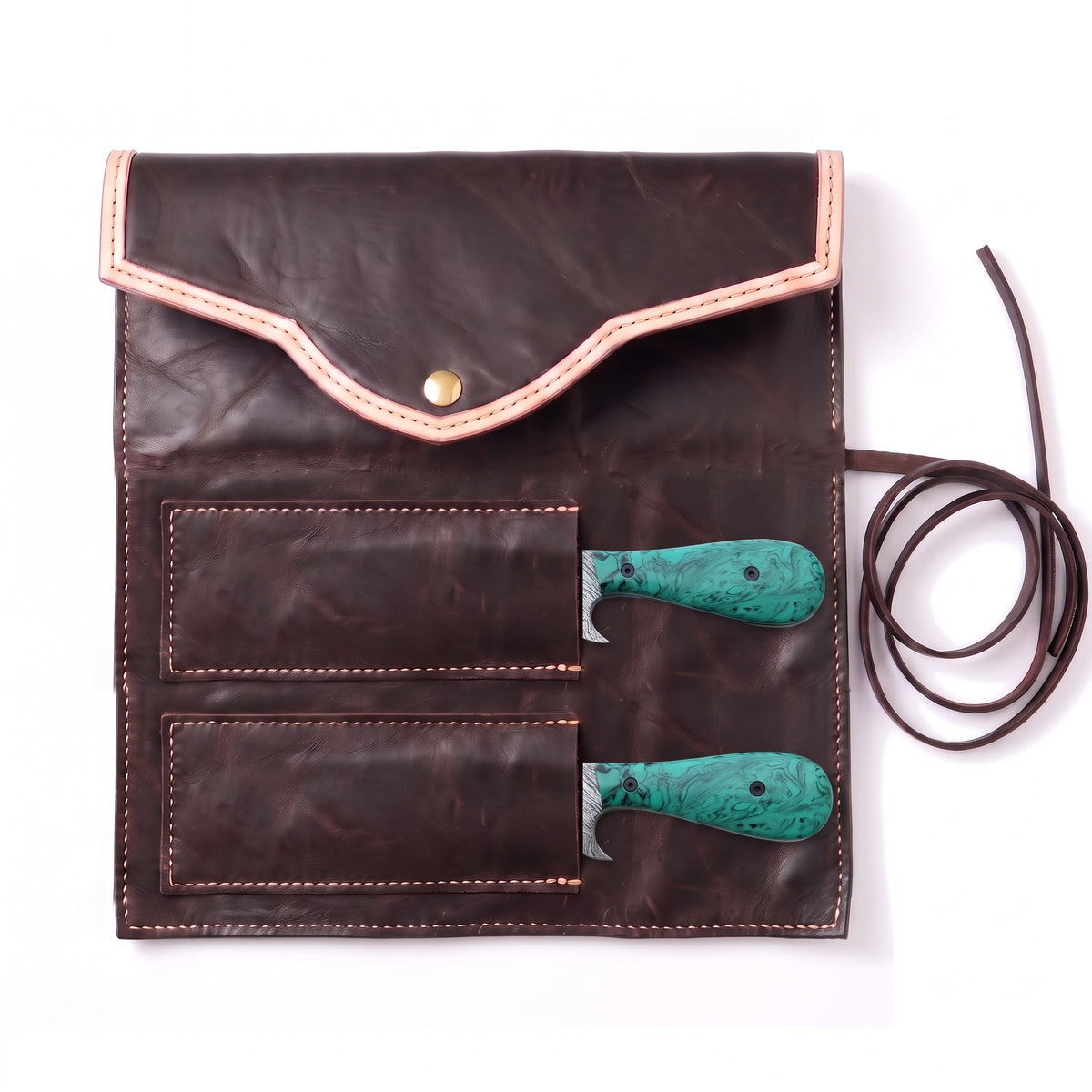 Ranch Damascus Bull Cutter Pair | Turquoise, seated in the Crownridge knife roll