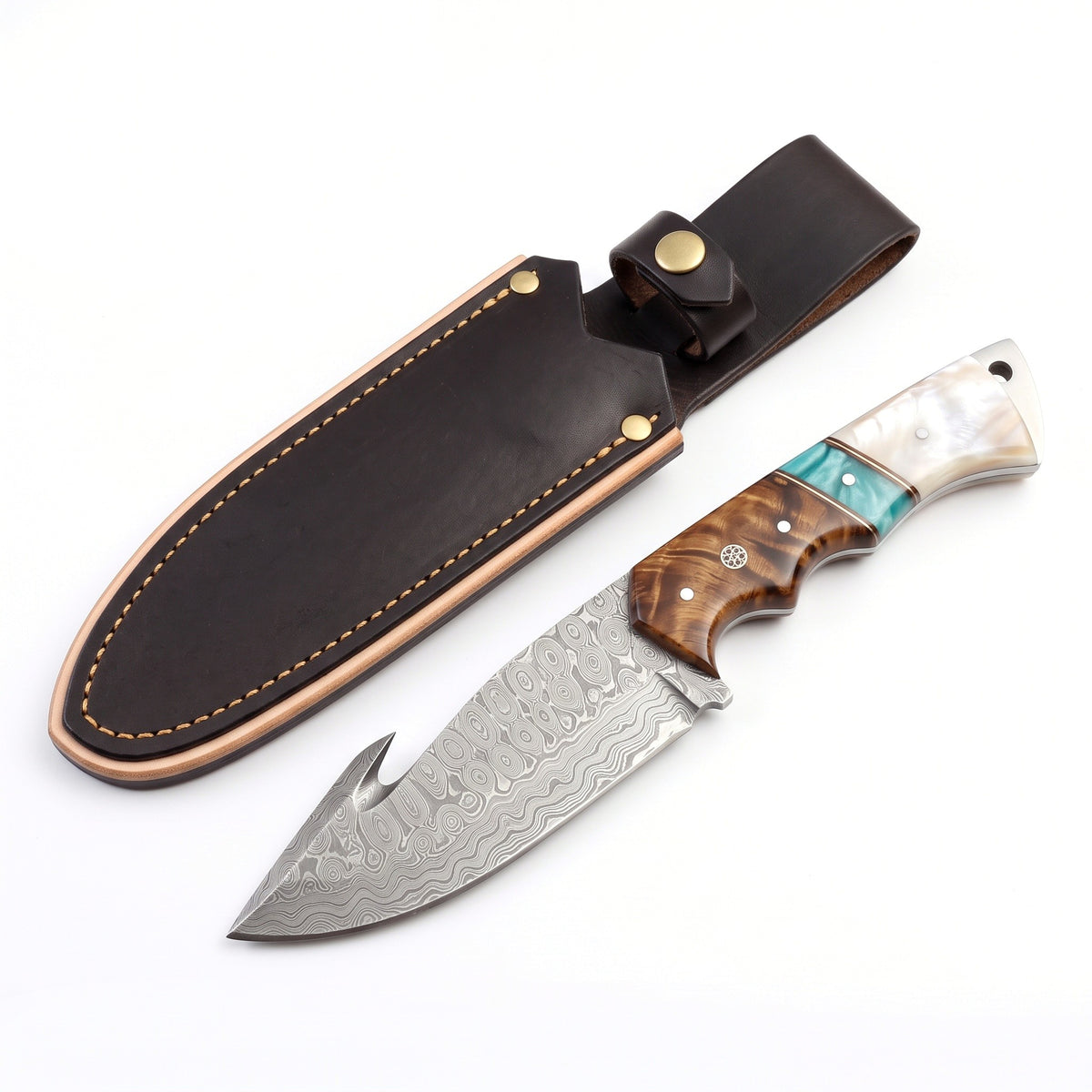 Ridgeback 10" Damascus Gut Hook Knife | Mother of Pearl, three-quarter view with the Crownridge sheath