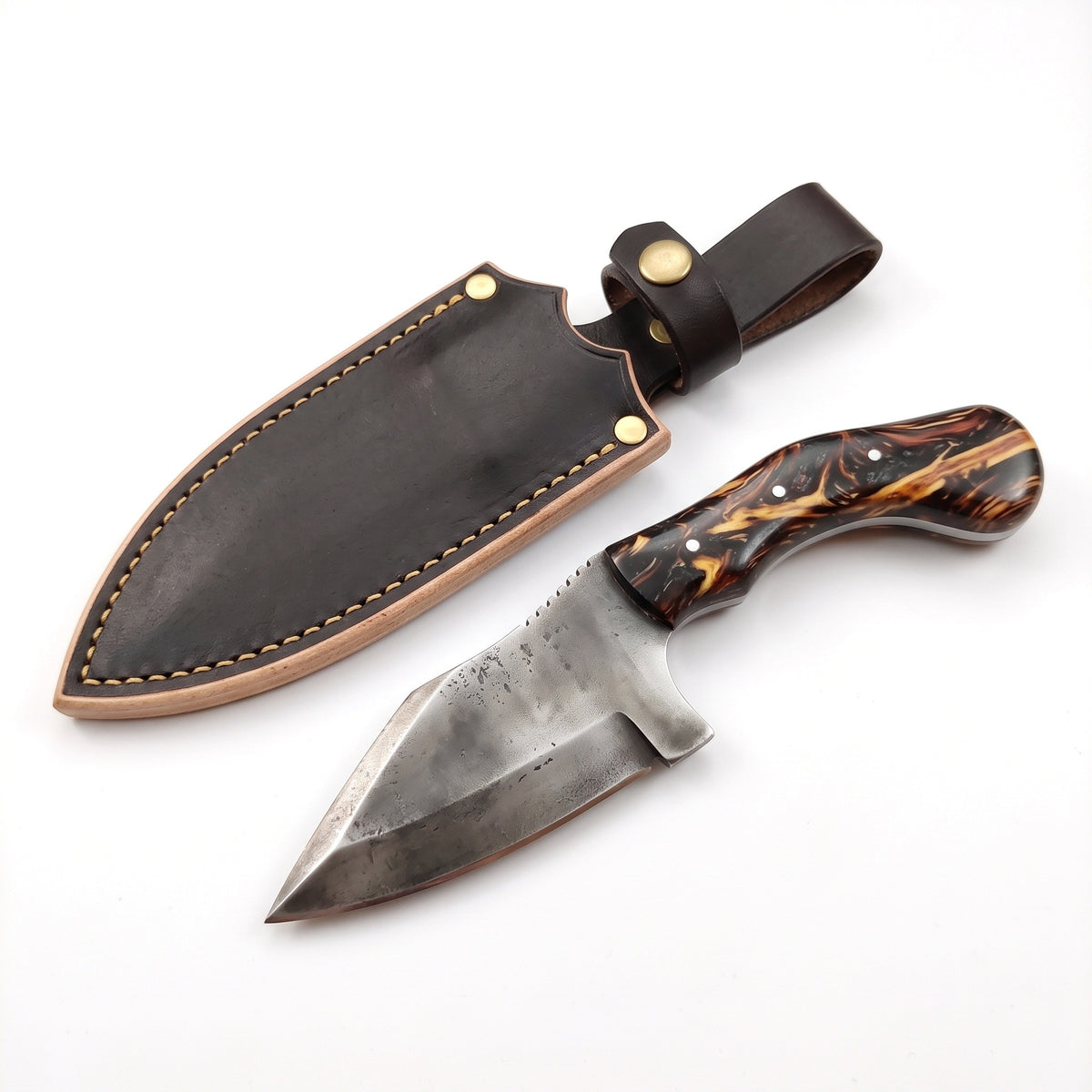 Ridgeback 7.5" Carbon Steel Hunting Knife | Resin, three-quarter view with the Crownridge sheath