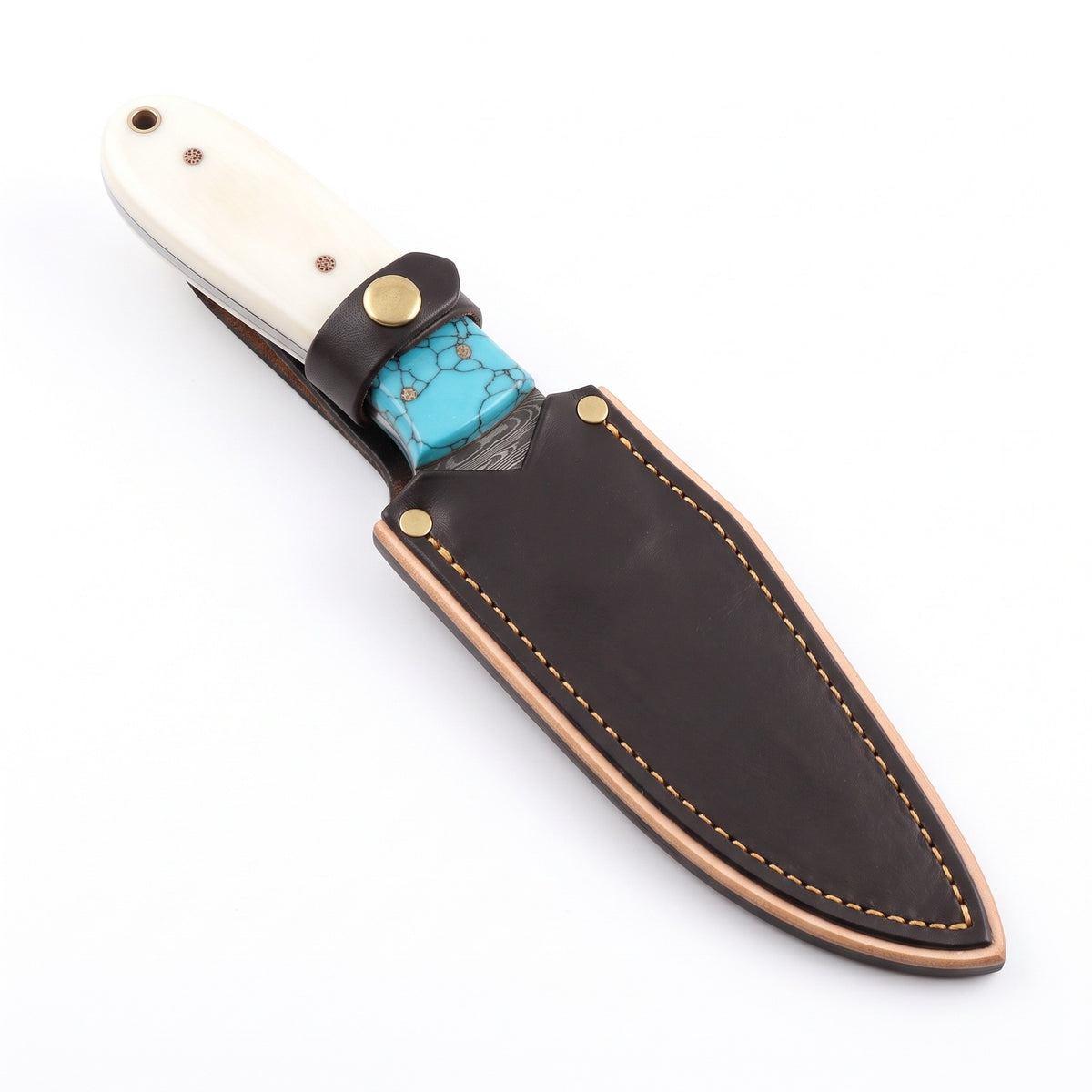 Ridgeback 8.5" Damascus Hunting Knife | Horn, seated in the Crownridge sheath
