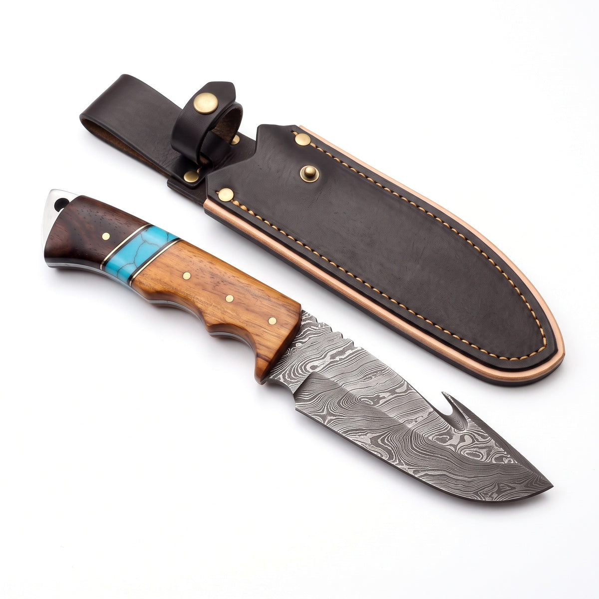 Ridgeback 8.7" Damascus Gut Hook Knife | Resin, three-quarter view with the Crownridge sheath