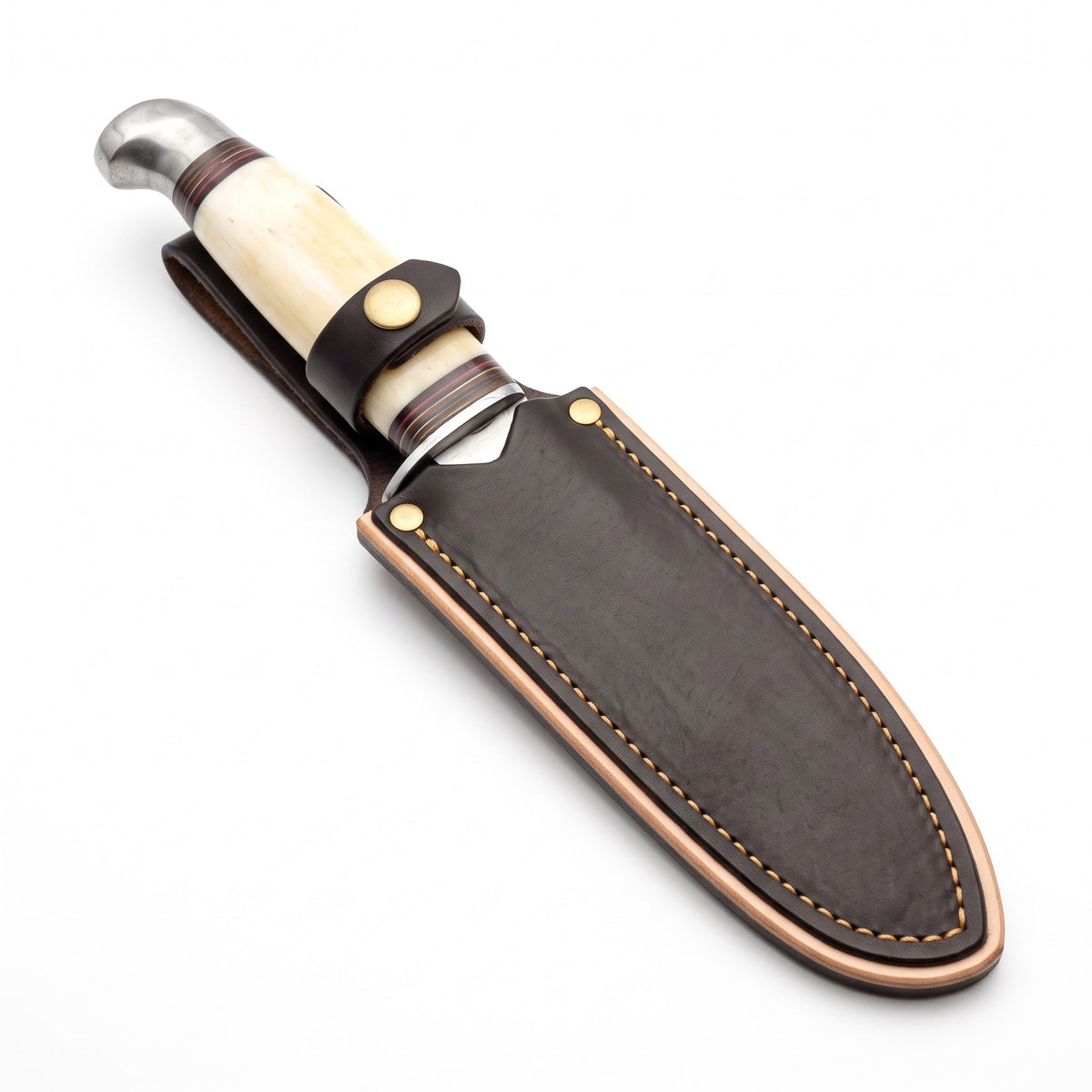 Ridgeback 8.5" Carbon Steel Hunting Knife | Bone & Brass, seated in the Crownridge sheath