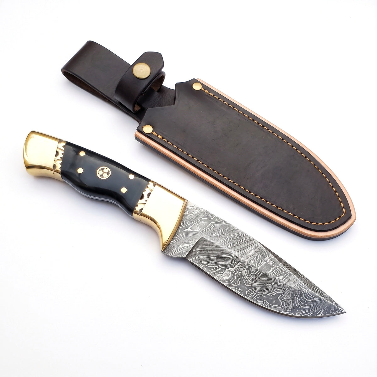 Ridgeback 8" Damascus Hunting Knife | Buffalo Horn & Brass, three-quarter view with the Crownridge sheath