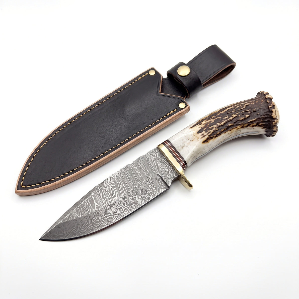 Ridgeback 9.2" Damascus Hunting Knife | Stag & Brass, three-quarter view with the Crownridge sheath