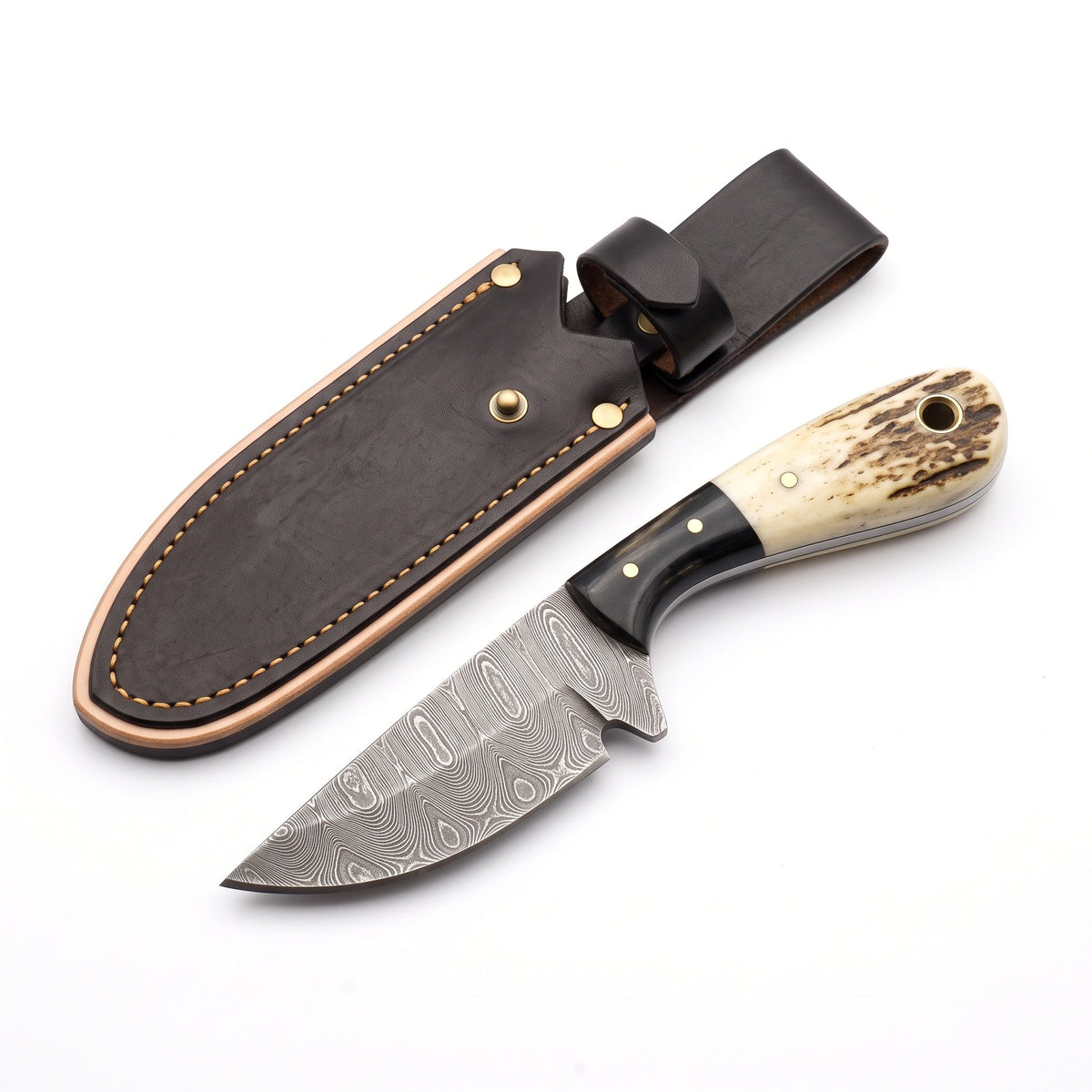 Trailhead 5.5" Damascus Neck Knife | Stag, three-quarter view with the Crownridge sheath