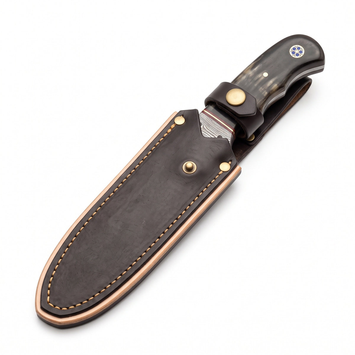 Trailhead 7.2" Damascus Skinning Knife | Buffalo Horn, seated in the Crownridge sheath