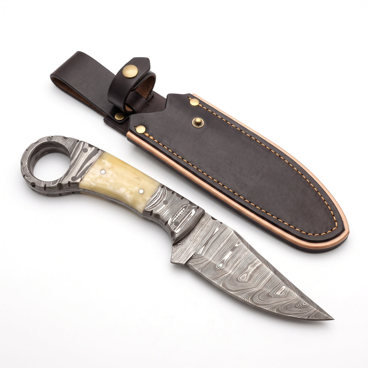 Trailhead 7.5" Damascus Skinning Knife | Bone, three-quarter view with the Crownridge sheath