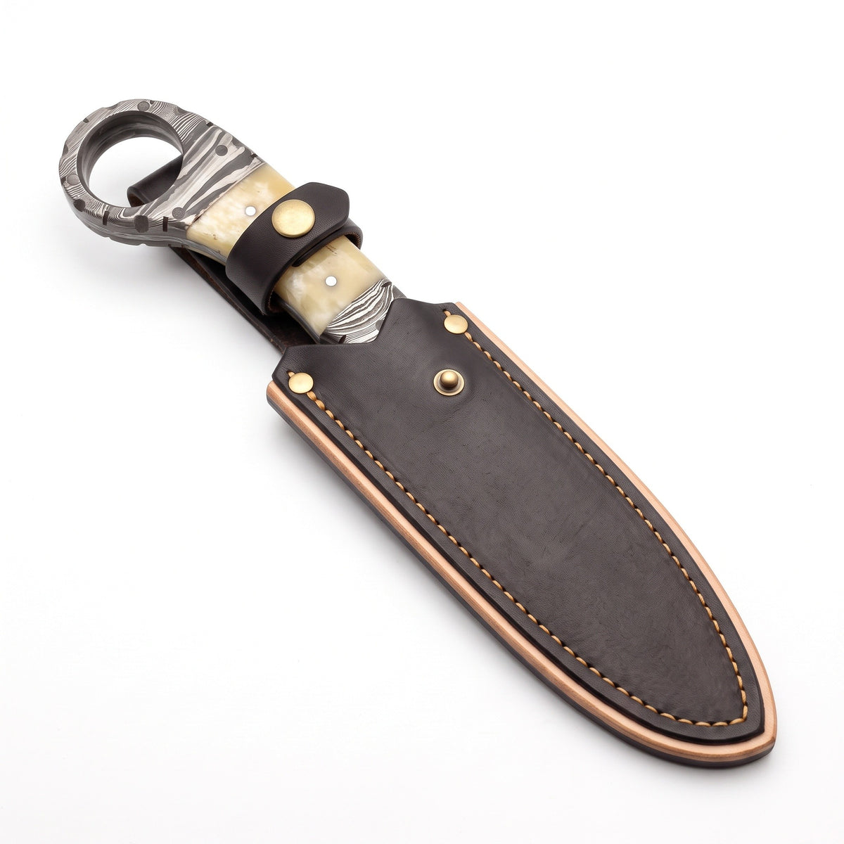Trailhead 7.5" Damascus Skinning Knife | Bone, seated in the Crownridge sheath