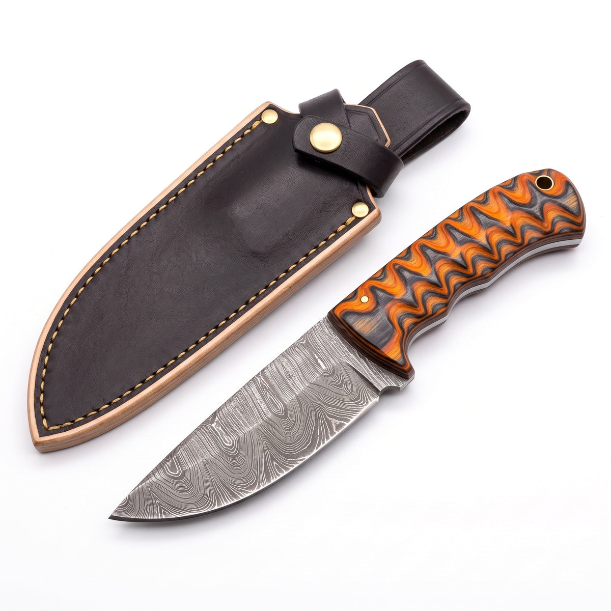 Trailhead 7.5" Damascus Skinning Knife | Hardwood, three-quarter view with the Crownridge sheath
